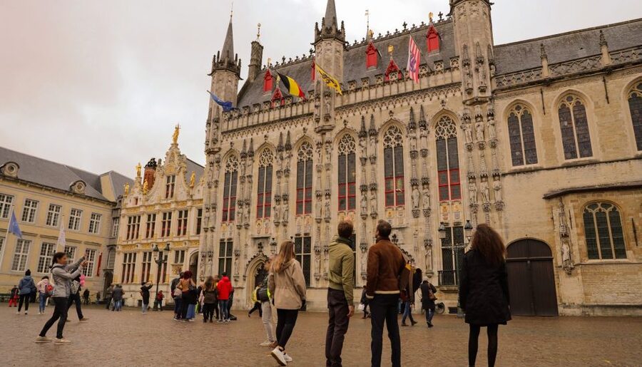 From Paris: Day Trip to Bruges with Optional Seasonal Cruise - Bruges squares, canals, and architecture