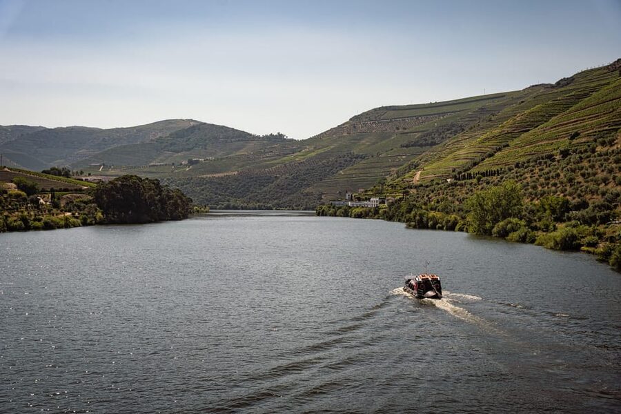 From Pinhão: Douro Valley Rabelo Boat Tour with Port Wine - Leaving Pinhão under the Eiffel Bridge