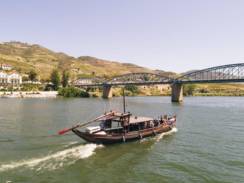 From Pinhão: Douro Valley Rabelo Boat Tour with Port Wine - What the boat is like in changing weather