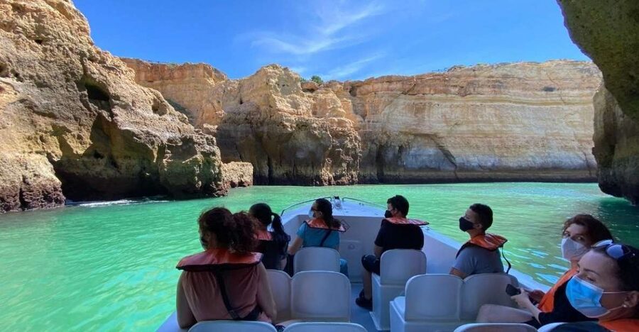 From Portimão: Algar de Benagil and Sea Caves Boat Tour - Entering the caves near Benagil