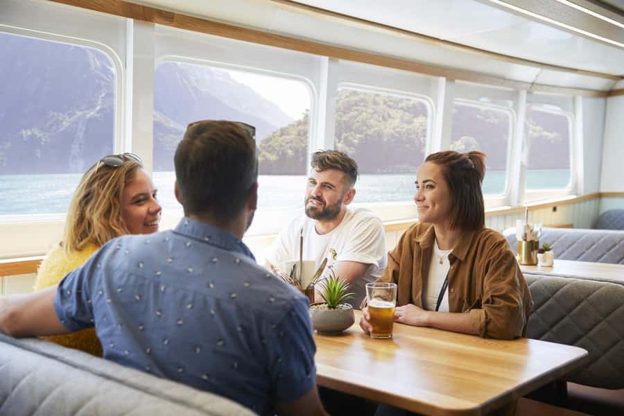From Queenstown: Milford Sound Cruise and Coach Day Tour - Mirror Lakes rewards a quick walk