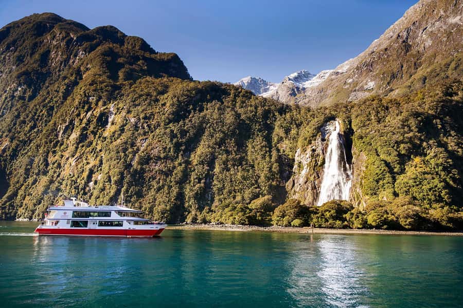 From Queenstown Milford Sound Cruise & Glass-Roof Coach Tour - Lake Wakatipu begins the scenic drive