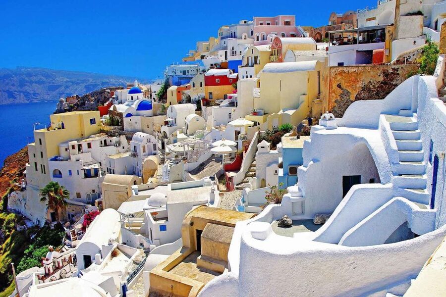 From Rethymno: Full-Day Trip to Santorini by Boat - Oia: the postcard view, with a short clock