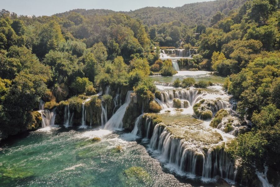 From Split: Krka Waterfalls Tour with Boat Cruise & Swimming - Jaruga hydroelectric power plant and river history
