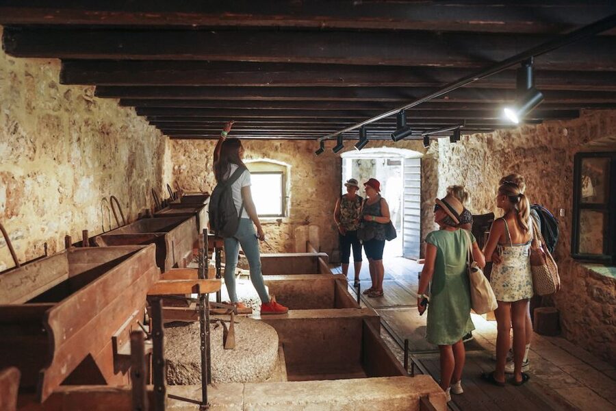 From Split: Krka Waterfalls Tour with Boat Cruise & Swimming - The small ethno-village and the old working world