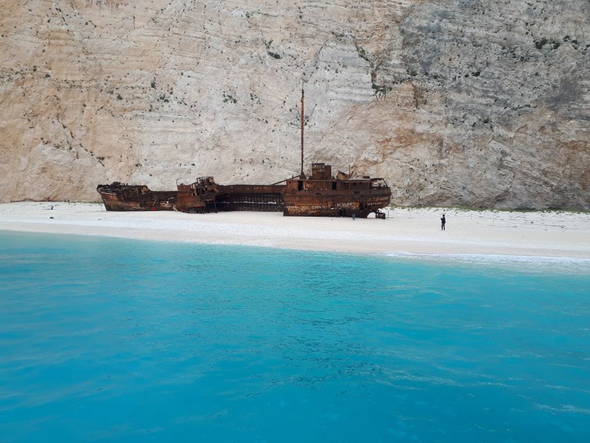 From St.Nikolaos: Boat Cruise to Navagio Beach & Blue Caves - What the Small Boat Adds