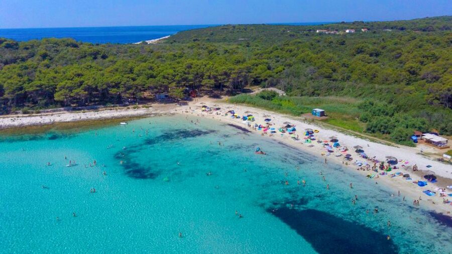 From Zadar: Full-Day Boat Trip to Sakarun Beach & Dugi Otok - Sakarun Beach: beautiful water, imperfect sand