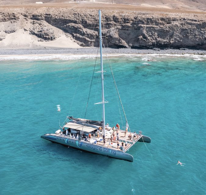 Fuerteventura: Magic Catamaran Trip with Food and Drinks - Lunch, drinks, and the onboard rhythm