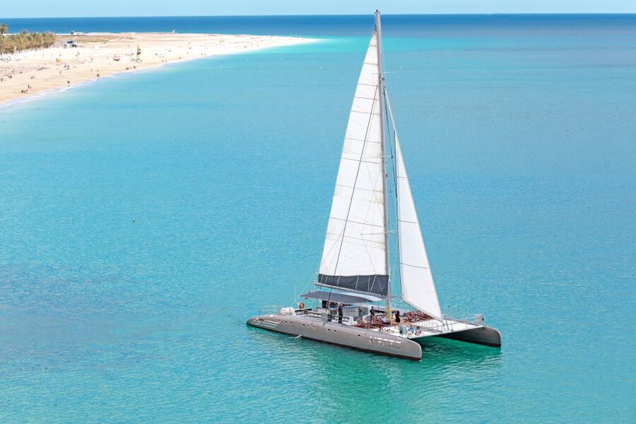 Fuerteventura: Magic Catamaran Trip with Food and Drinks - Along Fuerteventura’s volcanic southern coast