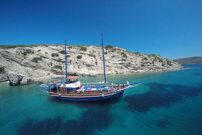 Full Day 3-Island Boat Cruise from Port of Kos - The Plati stop: clear water, dolphins, and a swim from the boat