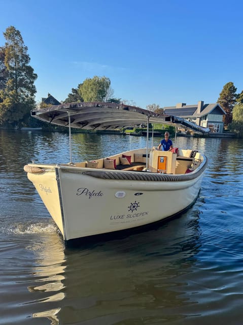 Haarlem: Guided Highlights Canal Cruise on Open Boat - Drinks, snacks, and the social feel
