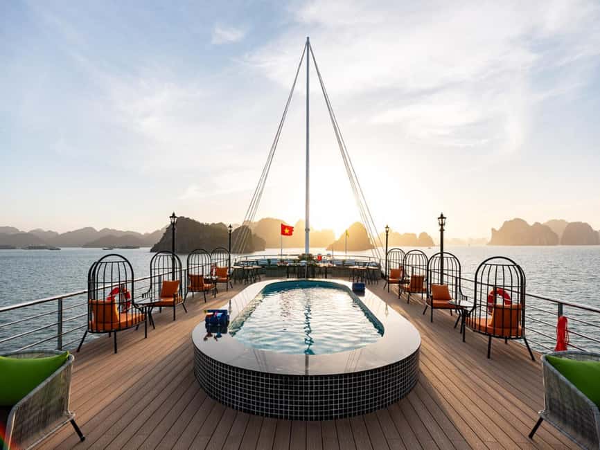 Halong Bay: Luxury Day Cruise w/ Pool, Kayak, Free Transfer - Boarding the modern boat and finding your space