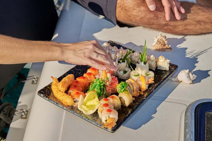 Hersonissos: Luxury Sunset Catamaran Cruise Sushi & Open Bar - Arriving at Saint George Bay