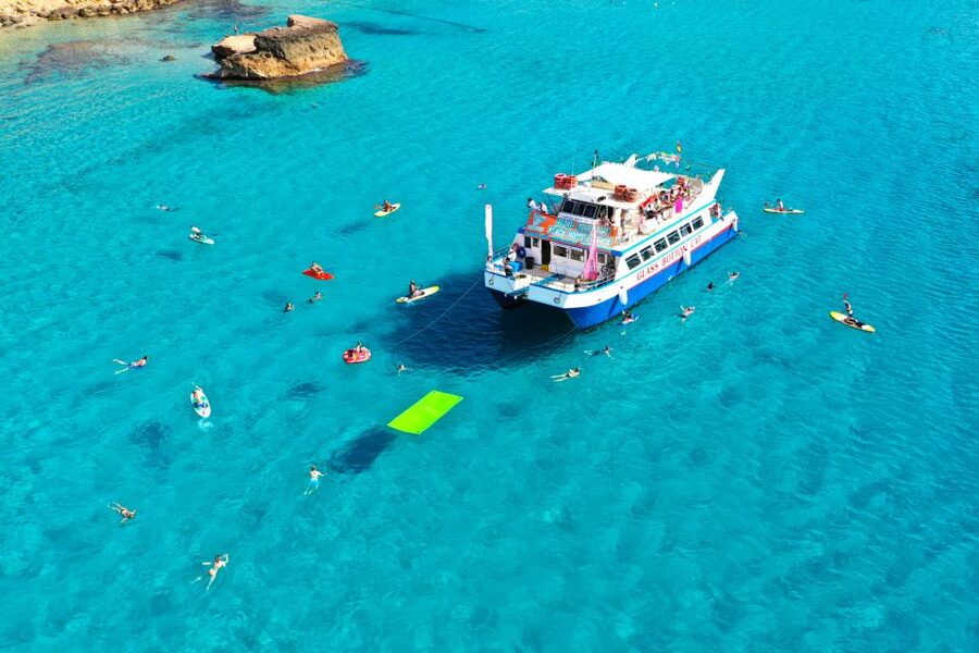 Ibiza: Beach Hopping Cruise w/ Paddleboard, Food, & Drinks - Cala Bassa: clear water and a proper beach stop