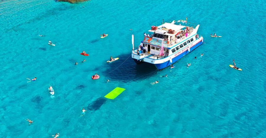 Ibiza: Beach Hopping Cruise w/ Paddleboard, Food, & Drinks - Cala Tarida and the open water activities