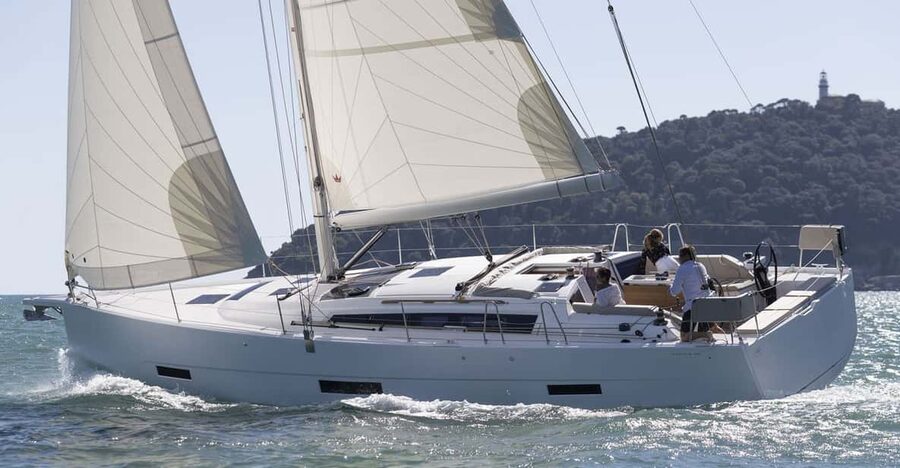 Ibiza: Midday or Sunset Sailing with Snacks and Open Bar - Ibiza’s coast from the open sea