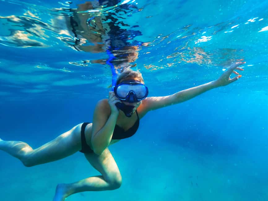 Ibiza: Snorkeling and SUP Paddle, Beach and Cave Boat Tour - Cala Comte: clear water and open views
