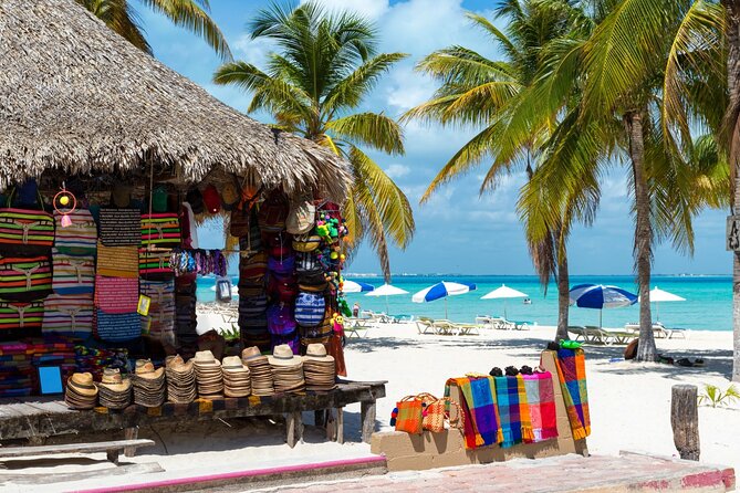 Isla Mujeres Catamaran Tour with Snorkel, Open bar and Transport - Open bar, music, and the return sail