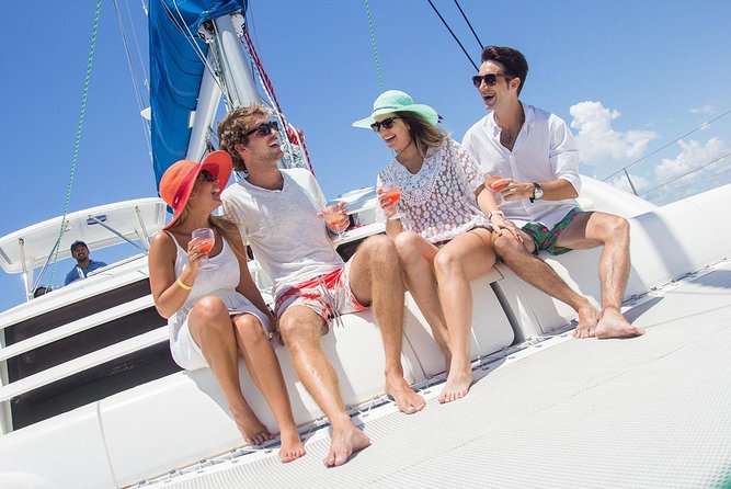 Isla Mujeres Luxury Sailing: Adults Only or Family Friendly - Setting sail with drinks, music, and open space