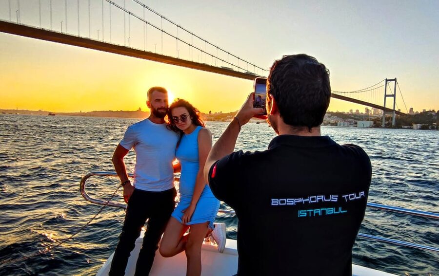 Istanbul: Bosphorus Sunset Yacht Cruise with Live Guide - Boarding at Kabatas and settling onto the yacht