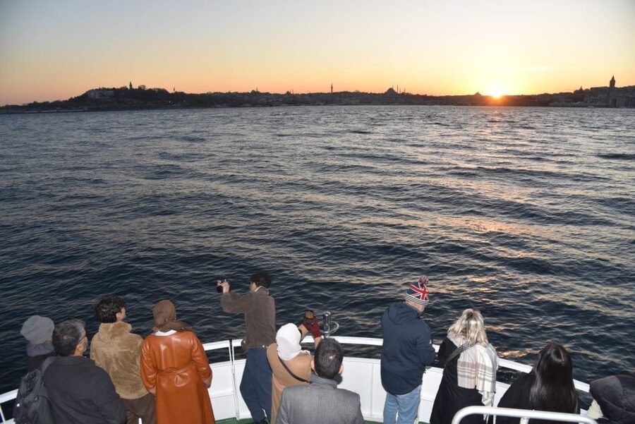 Istanbul: Explore Bosphorous on a Sunset Boat Cruise - Under the Bosphorus Bridge toward Bebek