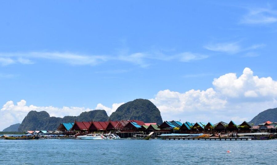 James Bond Island: Sightseeing Tour by Longtail Boat & Kayak - Tadan Pier and the traditional longtail boat