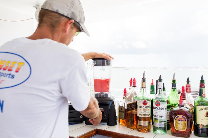 Key West Sunset Cruise: Dinner, Live Music & Drinks Included - Drinks included, with premium upgrades available