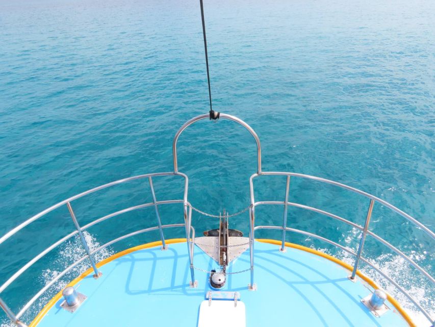 Kos Town: Glass-Bottom Boat Cruise with Swimming Stops - The crew and onboard atmosphere