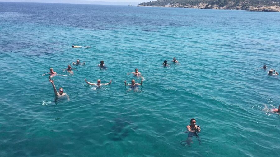 Kos Town: Kalymnos & Pserimos Day Cruise & Optional Transfer - A lively crew, music, and onboard drinks