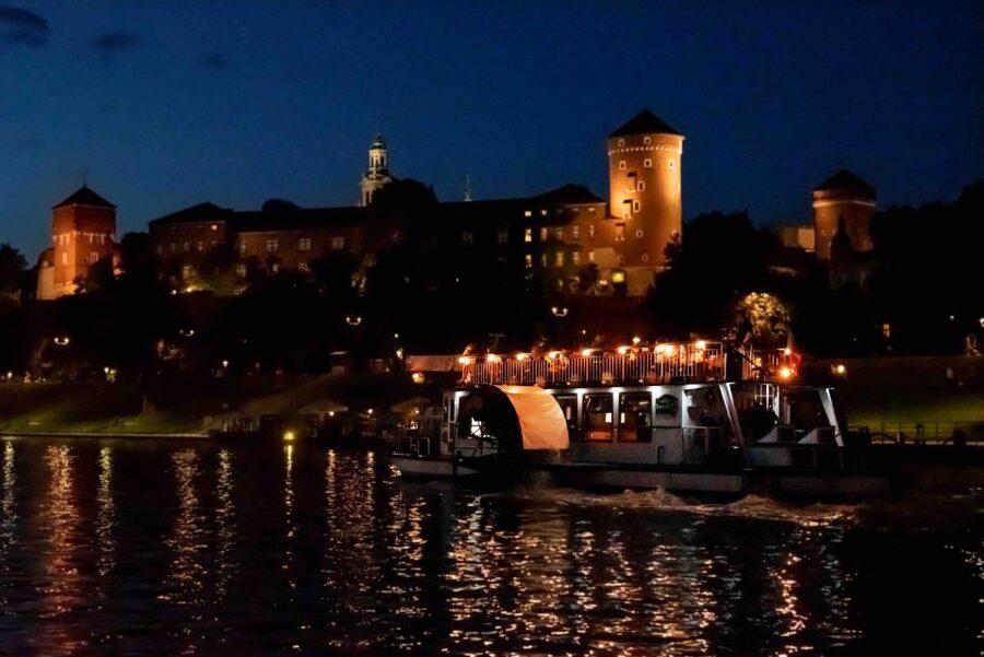 Krakow: 1-Hour Evening Vistula River Cruise - The audio guide and onboard atmosphere