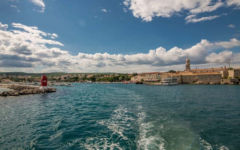 Krk: Golden Beach and Blue Cave Cruise with Welcome Drink - Plavnik Island and the Search for Dolphins