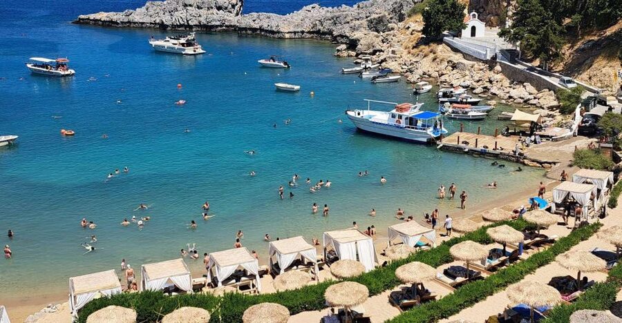 Lindos,Pefkos: All inclusive Swim & Snorkel Boat Cruise - Finding the boat at Vlycha Beach