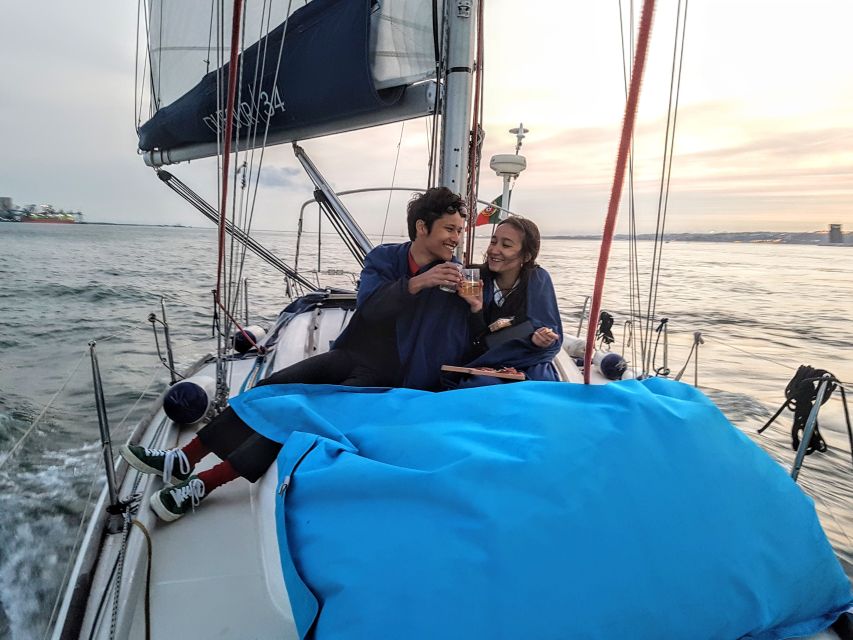 Lisbon: City Skyline Sailboat Cruise with Drink and Snacks - Starting beneath the 25 de Abril Bridge