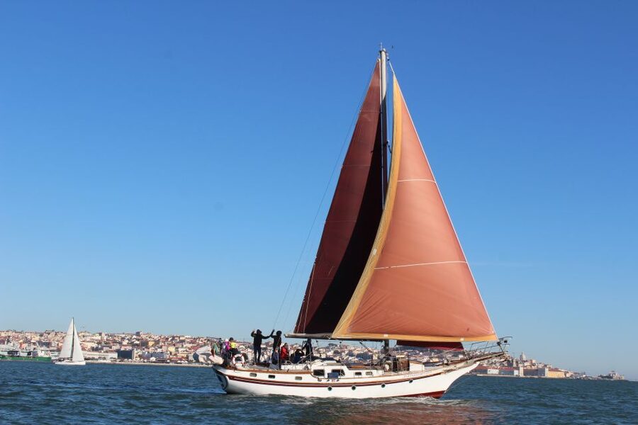 Lisbon: Daylight or Sunset on a Vintage Sailboat - Boarding under the 25 de Abril Bridge