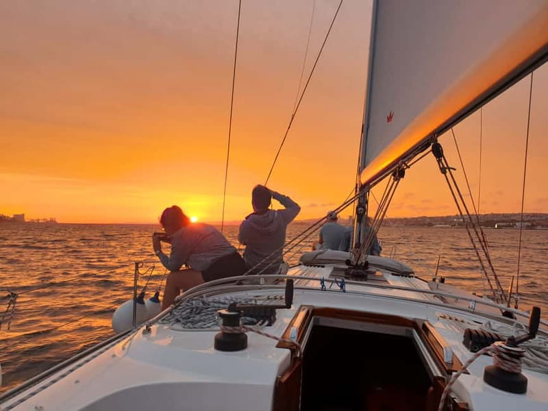 Lisbon: Daytime or Sunset Boat Cruise with History and Wine - A glass of wine and a quiet pace