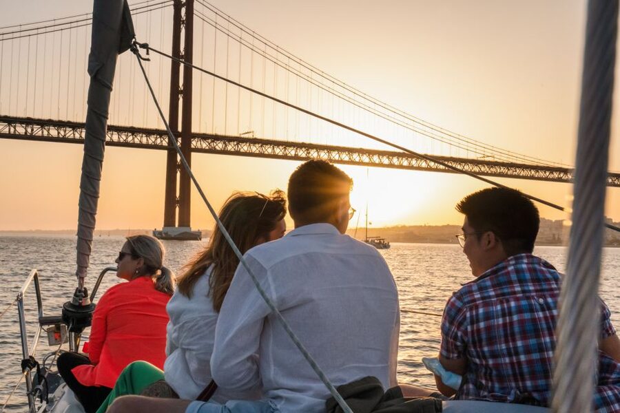 Lisbon: Daytime/Sunset/Night City Sailboat Tour with Drink - The return past Almada and Cristo-Rei