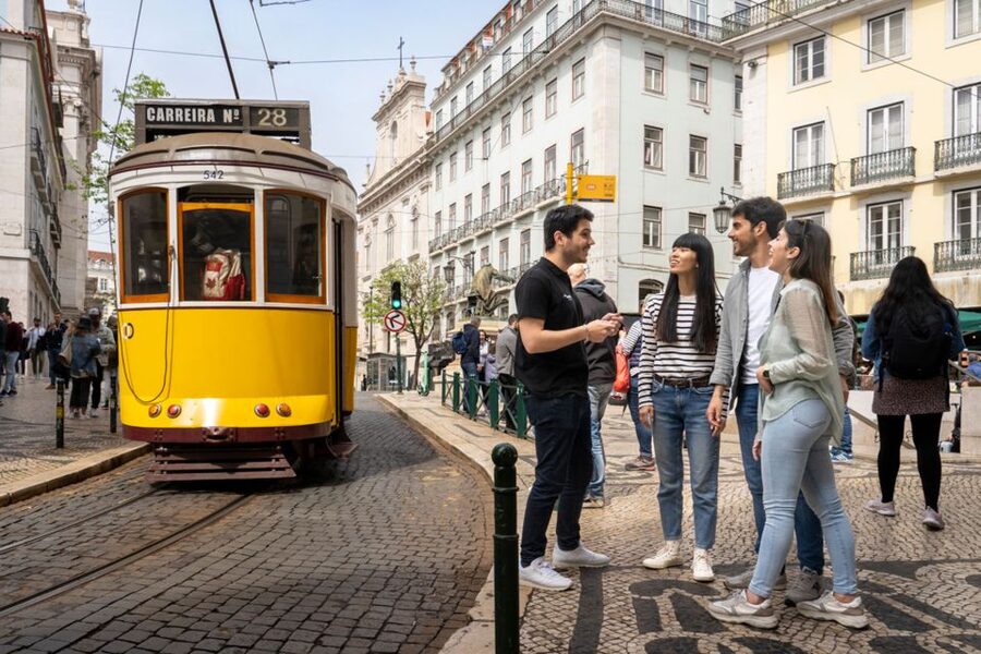 Lisbon: Helicopter Ride, Boat Trip, & Old Town Walking Tour - Belém from the water: towers, monuments, and modern design