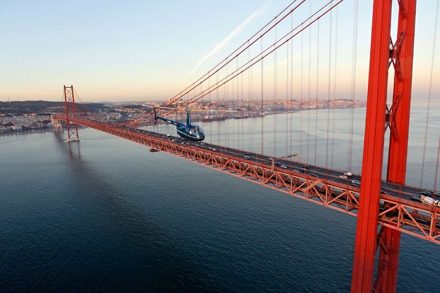 Lisbon: Helicopter Ride, Boat Trip, & Old Town Walking Tour - The helicopter flight over Belém and the 25th of April Bridge