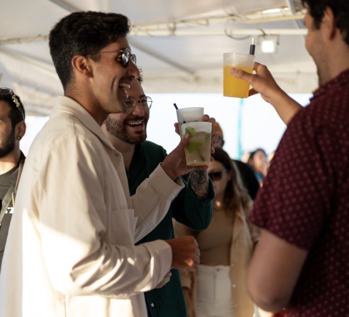 Lisbon: Sunset Boat Tour with Music and Drinks - Sunset, music, and the onboard bar