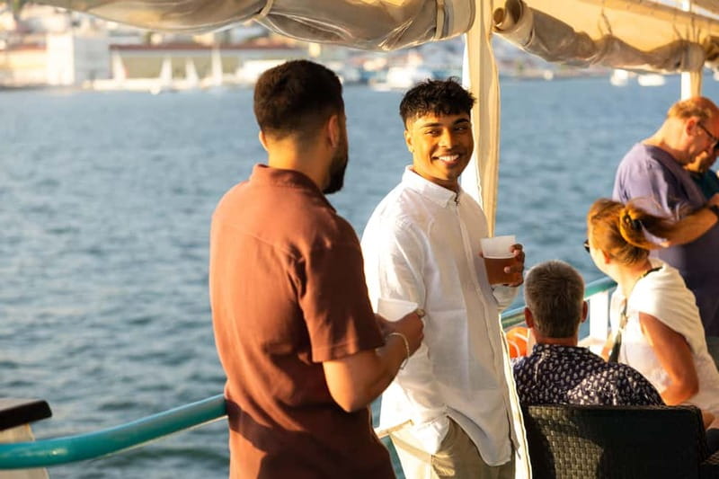 Lisbon: Sunset Boat Tour with Music and Drinks - The 25 de Abril Bridge from the Tagus