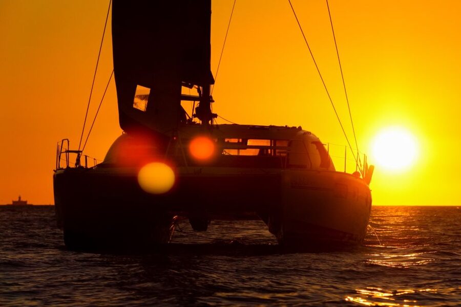 Lisbon: Sunset Cruise With Drinks on Spacious Yacht - Sunset, music, and changing weather