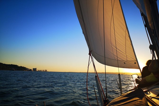 Lisbon: Sunset Sailing with Portuguese Wine and History - Christ the King and the wide Tagus view