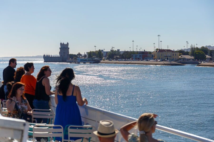 Lisbon: Tagus River Cruise with Welcome Drink - The boat, seating, and welcome drink