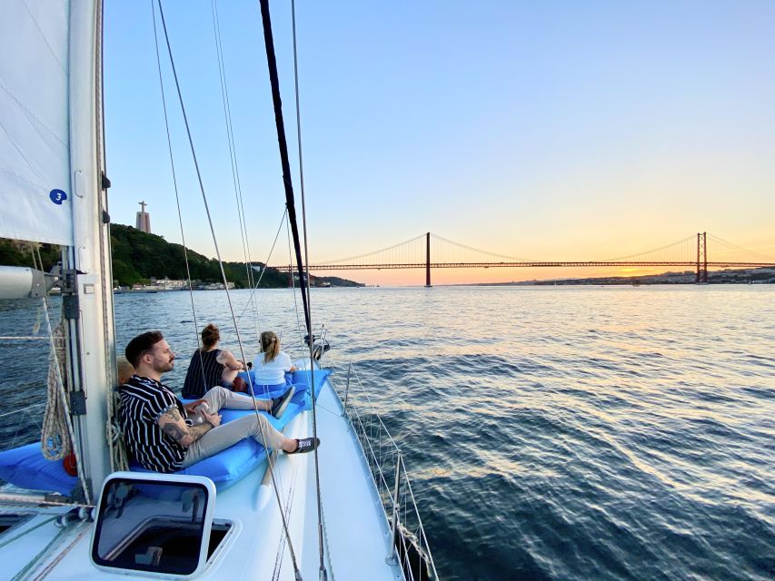 Lisbon: Tagus River Sunset Cruise with Drinks - Cacilhas and Christ the King across the river