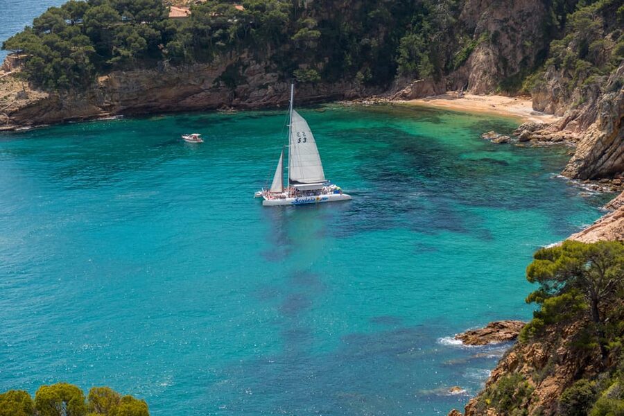 Lloret de Mar: Catamaran Sailing Cruise with BBQ and Drinks - The anchor stop: two hours for swimming and play