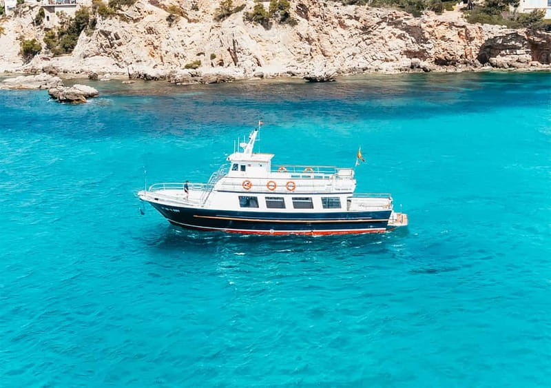Mallorca: Palma Boat Tour & Snorkeling with Drink Included - Drinks, music, and the onboard mood