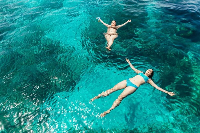 Malta: Blue Lagoon, Beaches & Bays Trip by Catamaran - Anchor Bay and Popeye’s Village