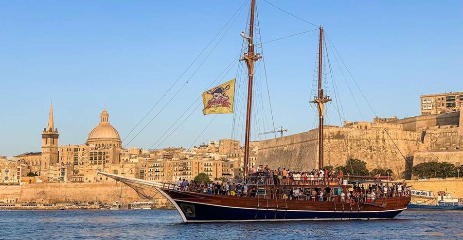 Malta: Lazy Pirate Boat Party with Drinks & Food - Leaving Sliema as the sun goes down