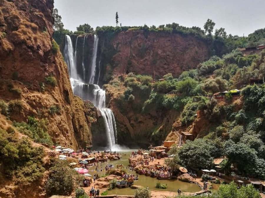 Marrakesh: Ouzoud Waterfalls Trip with Hike & Boat Option - Arriving at the falls and meeting your guide