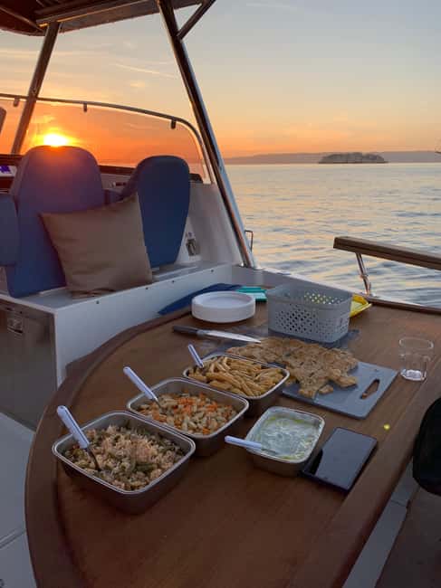 Marseille: Sunset Boat Cruise with Buffet and Organic Wine - The Frioul archipelago and its wild cove